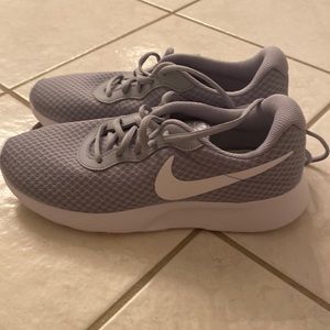 Brand new grey and white Nike shoes